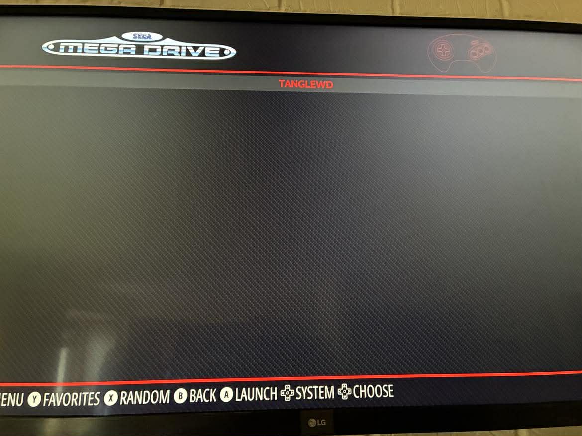 EmulationStation showing the Sega Mega Drive game list with Tanglewood selected