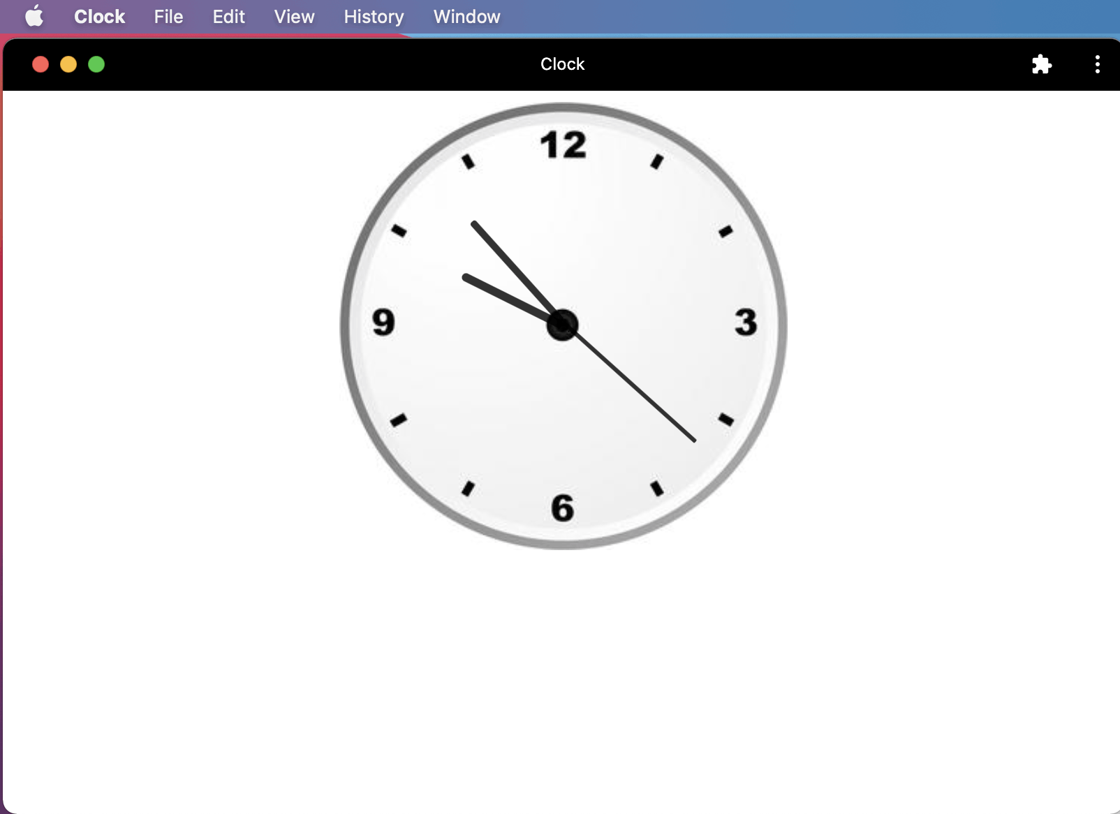 The Clock Application running on the MacBook