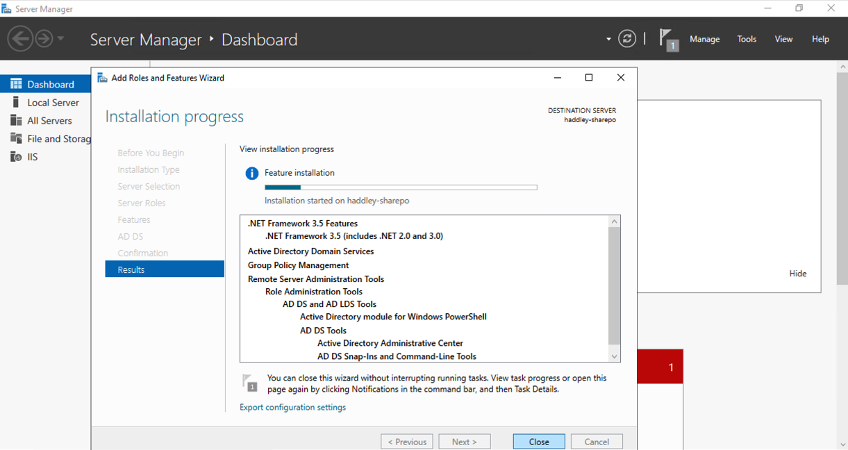 The installation progress screen showed AD DS and related features being installed