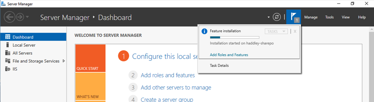 Server Manager showed feature installation in progress in the notifications area