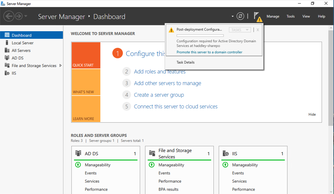 Server Manager showed a post-deployment notification prompting me to promote the server to a domain controller