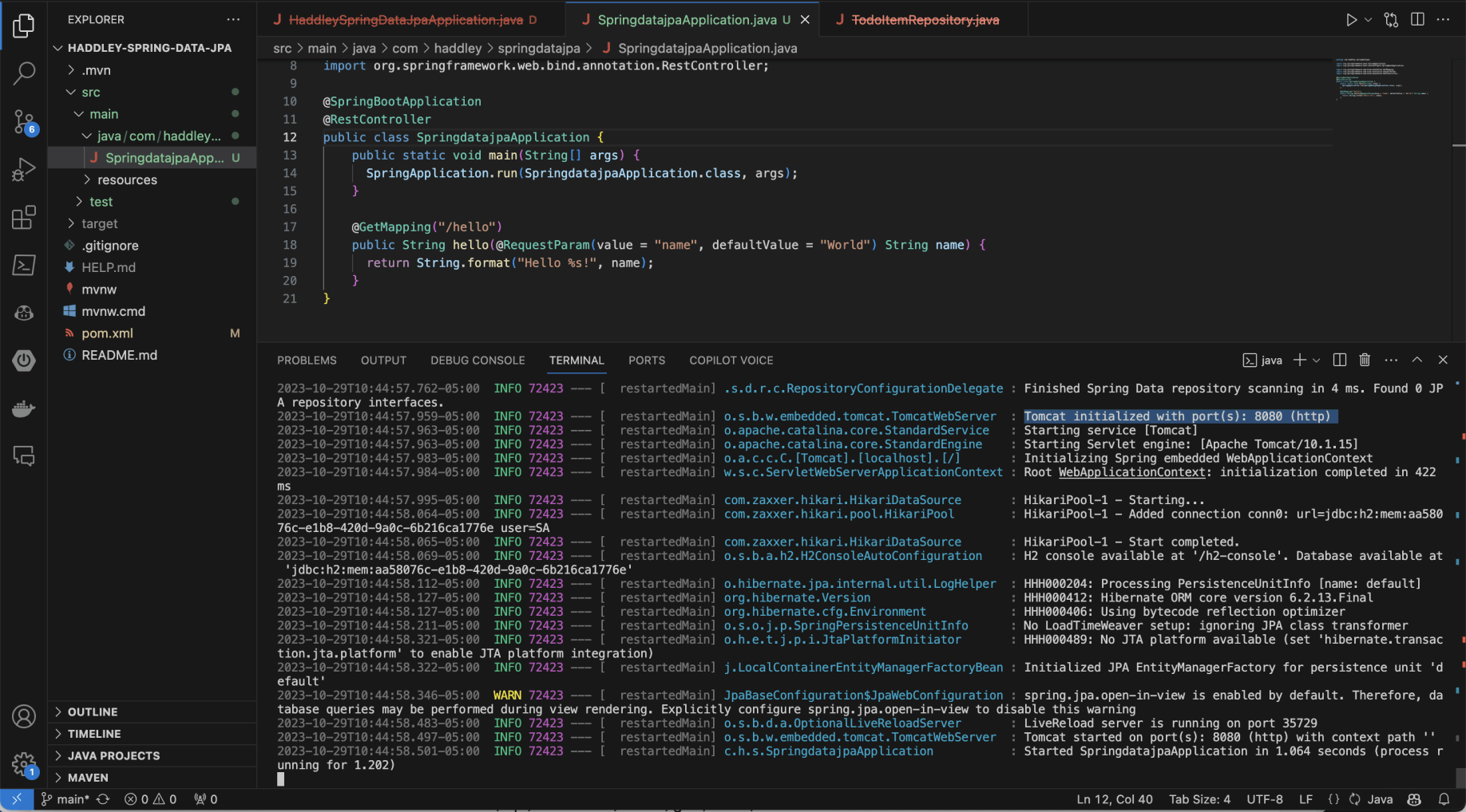 I updated SpringdatajpaApplication.java so that it would respond to http://localhost/hello requests